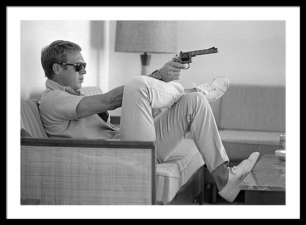 Man Relaxing with a Revolver Framed Print