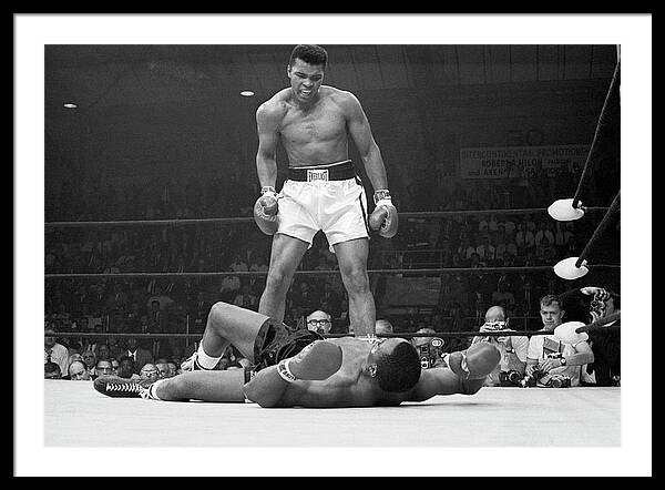 Muhammad Ali's Iconic Victory Pose Framed Print