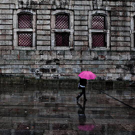 The pink umbrella by Jorge Maia
